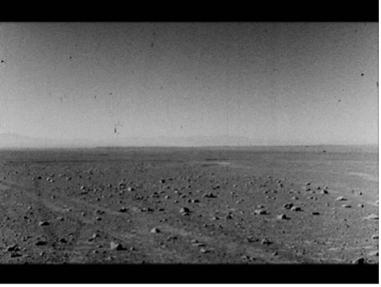 black and white image of the barren landscape of the Atacama desert